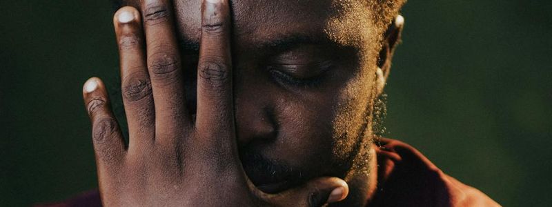 Serene face of a person in deep meditation.